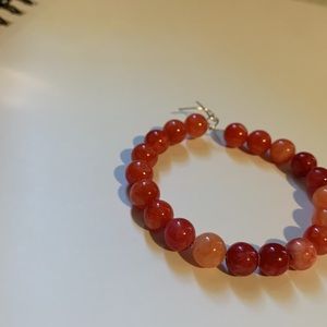 A glass bead , wire wrap bracelet.